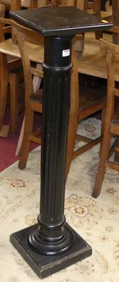 Lot 1330 - A circa 1900 ebonised square pedestal...