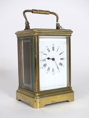 Lot 507 - A lacquered brass carriage clock, having a...