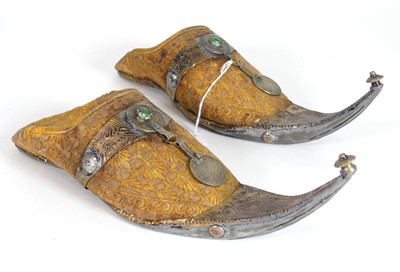 Lot 508 - A pair of Moroccan metal mounted babouches,...