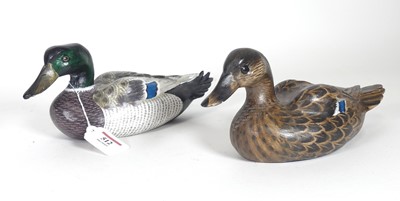 Lot 512 - A pair of contemporary carved and painted...