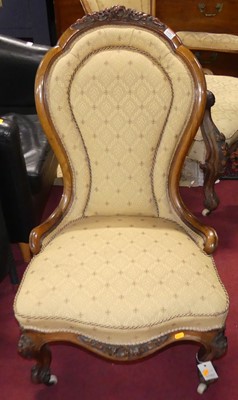 Lot 1351 - A pair of mid-Victorian floral carved walnut...