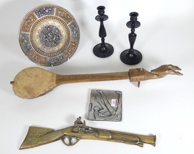 Lot 517 - An Indian brass dish, relief decorated with...