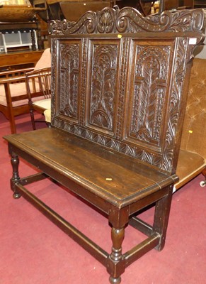 Lot 1367 - A joined and floral relief carved...