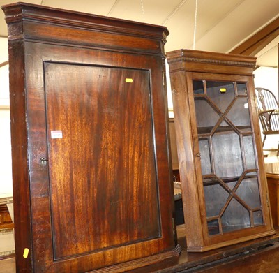 Lot 1385 - An early 19th century mahogany single dor...