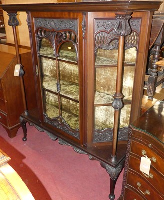 Lot 1393 - An Art Nouveau mahogany single door glazed...