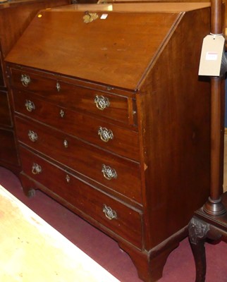 Lot 1276 - An early 19th century mahogany slopefront...