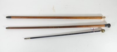 Lot 526 - A Victorian walking stick, having a yellow...