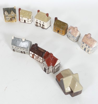 Lot 55 - A collection of Mudlen studio pottery cottages,...