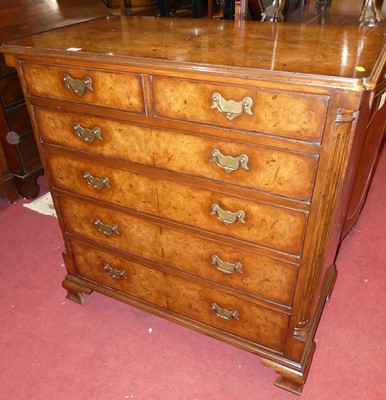 Lot 1404 - A Georgian style burr walnut chest of five...