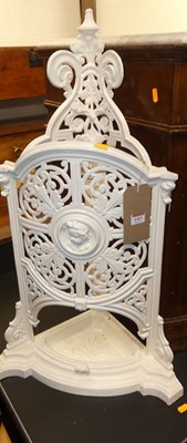 Lot 1411 - A floral pierced cast iron corner stickstand,...