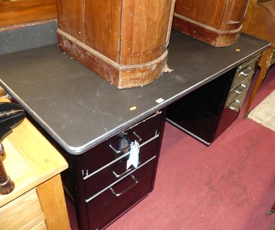 Lot 1412 - An Art Deco style black painted and polished...