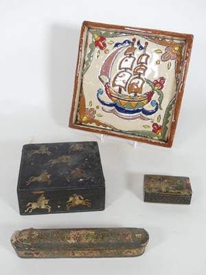 Lot 66 - A Persian papier mache Qalamdan, decorated...