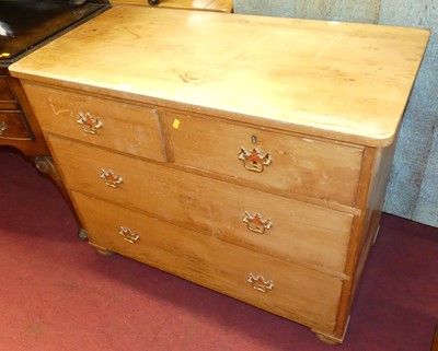 Lot 1421 - A rustic pine low chest of two short over two...