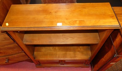 Lot 1424 - A contemporary cherrywood low freestanding...