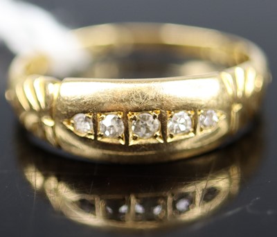Lot 349 - A George V 18ct gold diamond half-hoop ring,...