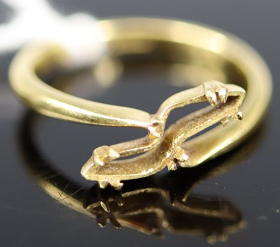 Lot 353 - An 18ct gold ring, formally set with a single...