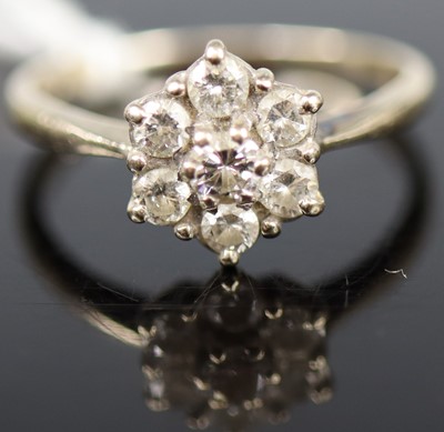 Lot 356 - An 18ct white gold diamond flower head cluster...