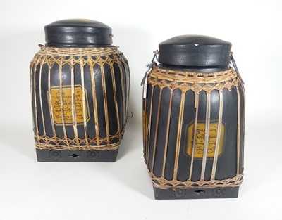 Lot 94 - A black painted rattan jar and cover,...