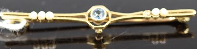 Lot 362 - A yellow metal sapphire and seed pearl set bar...