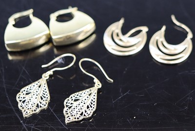 Lot 372 - Three pairs of modern hollow 9ct gold earrings,...