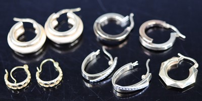 Lot 377 - Four pairs of modern hollow 9ct gold earrings,...
