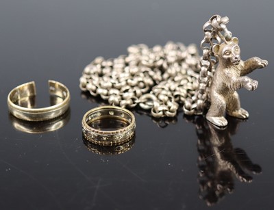 Lot 378 - A silver pendant fashioned as a walking bear,...