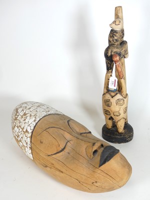 Lot 126 - An African hardwood carving of a head, h.55cm,...