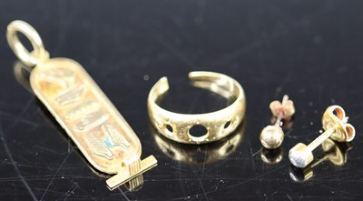 Lot 383 - A middle-eastern yellow metal Hieroglyphic...