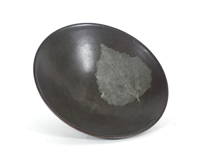 Lot 138 - A Chinese green glazed footed bowl, decorated...