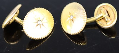 Lot 388 - A pair of yellow metal and diamond set oval...