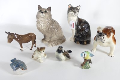 Lot 165 - A Royal Doulton figure of a Persian cat,...