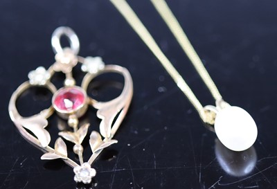 Lot 400 - An Edwardian 9ct gold red stone and seed pearl...