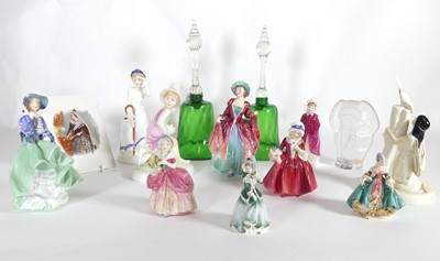 Lot 143 - A collection of Doulton figures, to include...