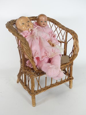 Lot 547 - An early 20th century doll, having a painted...