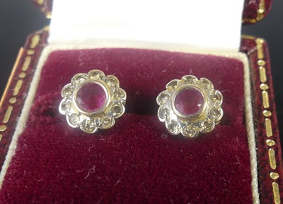 Lot 407 - A pair of 9ct gold ruby and diamond point set...