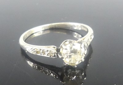 Lot 447 - A platinum diamond solitaire ring, the claw...