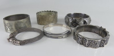 Lot 436 - Assorted white metal bangles, to include a...