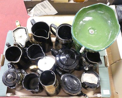 Lot 562 - An Art Nouveau green glazed pottery...