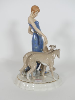 Lot 21 - A Royal Dux porcelain figure, of a lady...