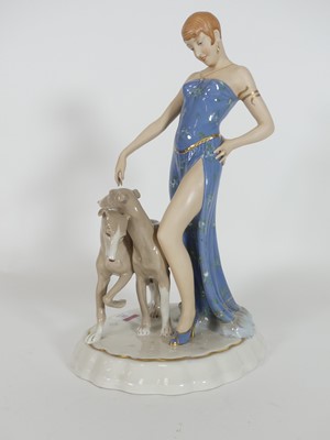Lot 21 - A Royal Dux porcelain figure, of a lady...