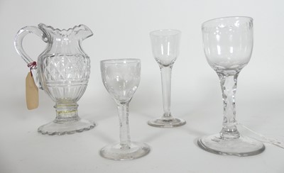 Lot 108 - An 18th century wine glass, having a faceted...