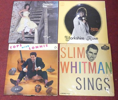 Lot 589 - A box of 12' vinyl records and 7' singles to...