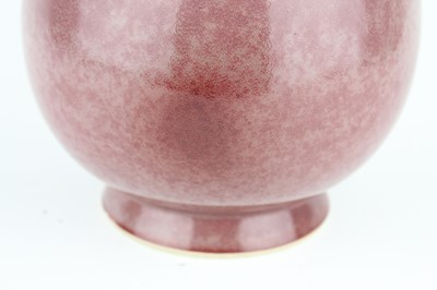 Lot 90 - A Chinese peach bloom-glazed jar, Xiafeng mark...