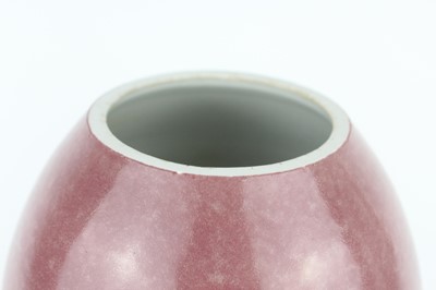 Lot 90 - A Chinese peach bloom-glazed jar, Xiafeng mark...