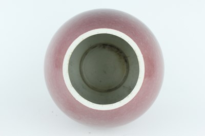 Lot 90 - A Chinese peach bloom-glazed jar, Xiafeng mark...