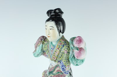 Lot 131 - A Chinese famille rose figure of a lady...