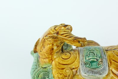 Lot 129 - Three Chinese sancai-glazed figures, Qing...