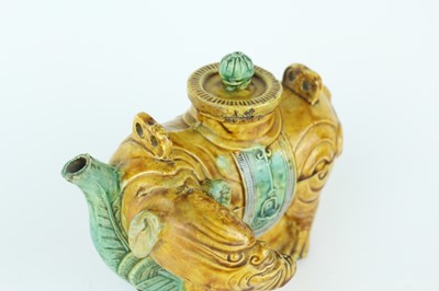 Lot 129 - Three Chinese sancai-glazed figures, Qing...