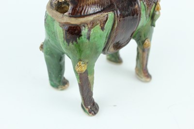 Lot 129 - Three Chinese sancai-glazed figures, Qing...