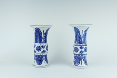 Lot 22 - A pair of Chinese blue and white gu vases,...